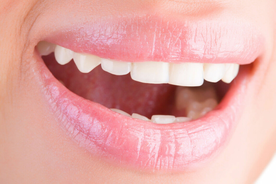Bright woman smile closeup.