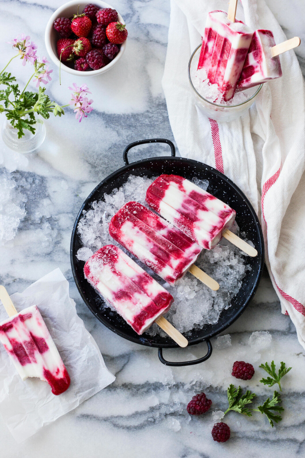 Berry Yogurt Popsicles on Vintage Pan and Marble Top