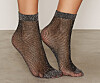 Glittriga n&auml;tstrumpor fr&aring;n Nly Lingerie.