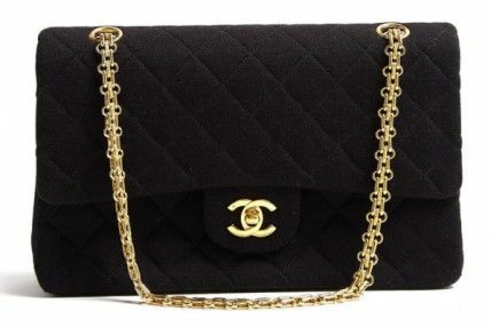 Begagnad Chanel 2.55 i svart jersey. Begagnad Chanel 2.55 i svart jersey.