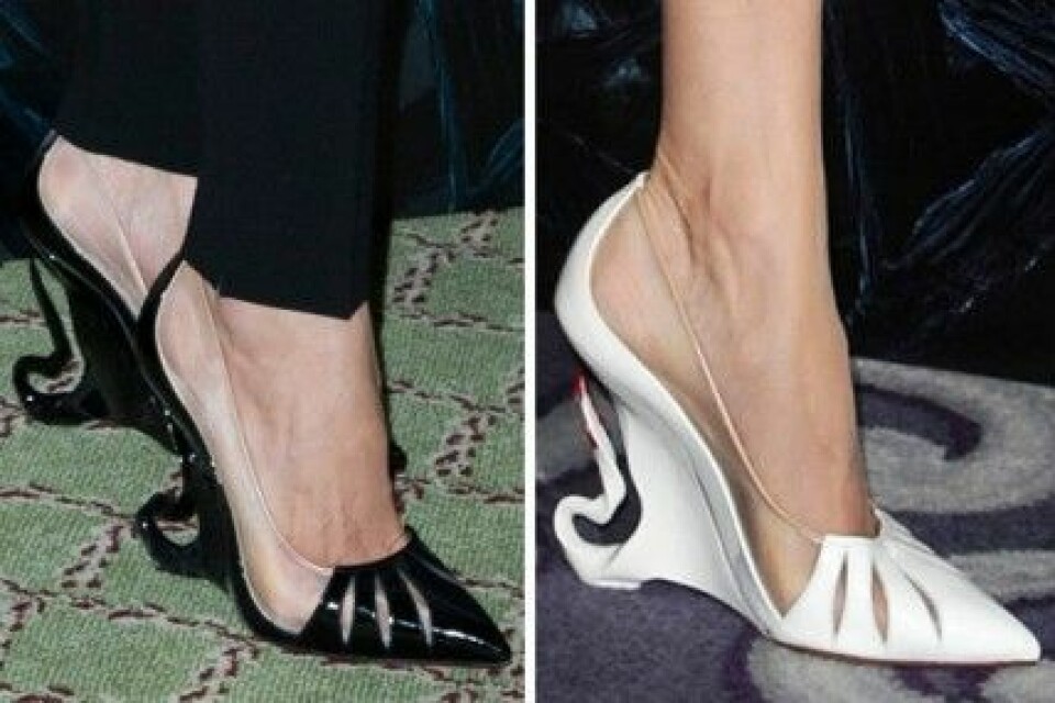 Angelina Jolie bar Louboutins i svart och vitt pår premiären av ”Malificent. Angelina Jolie bar Louboutins i svart och vitt pår premiären av ”Malificent.