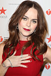 Orange is the new black-skådisen Taryn Manning matchar sin outfit.