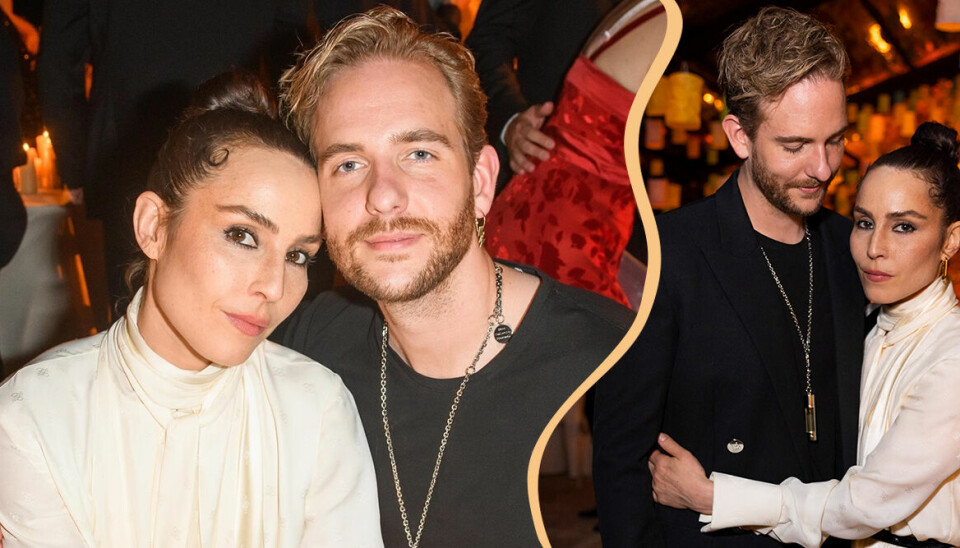 Här kysser Noomi Rapace och Victor Thell varandra på röda mattan
