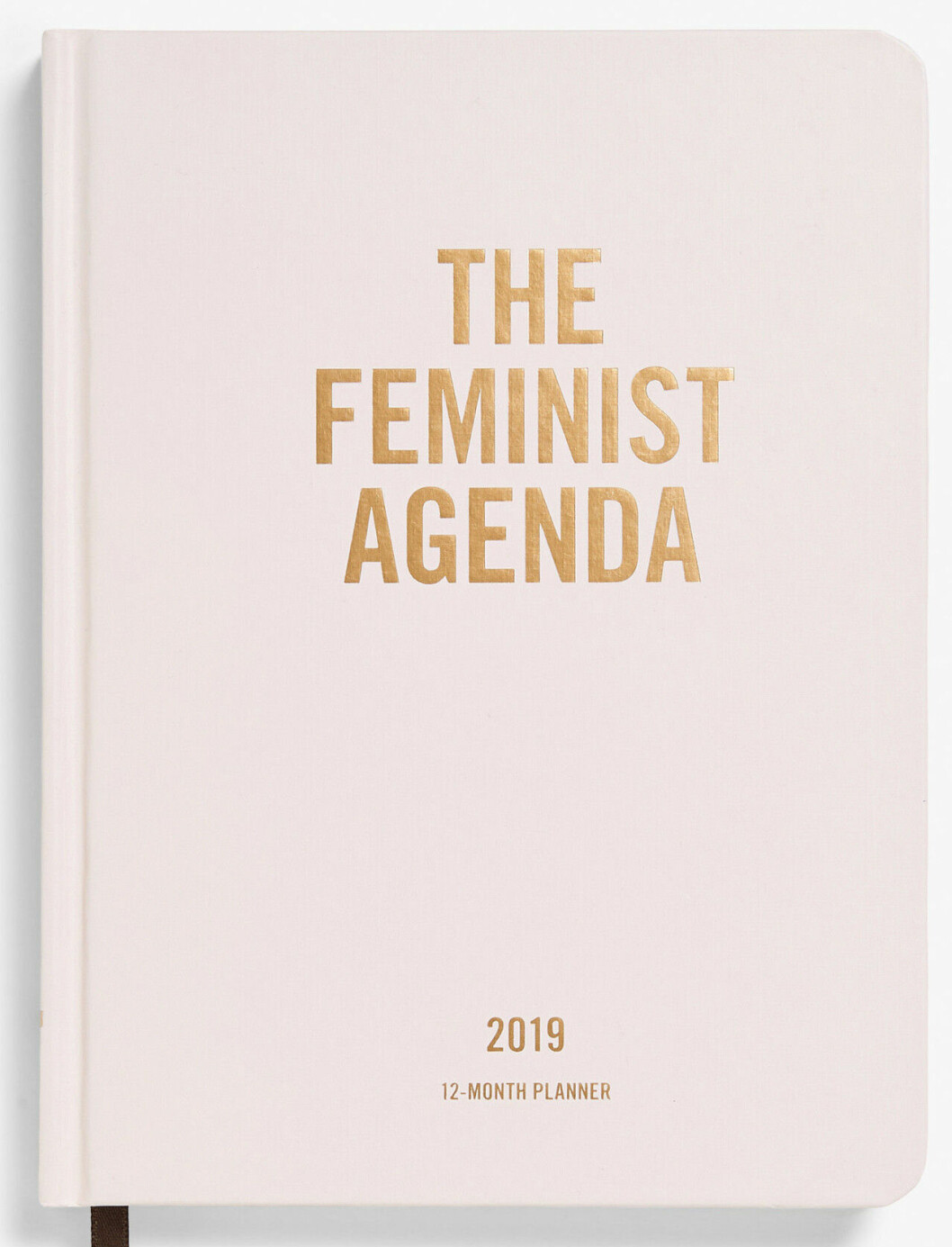 Kalendern med texten  ”The Feminist Agenda” på framsidan