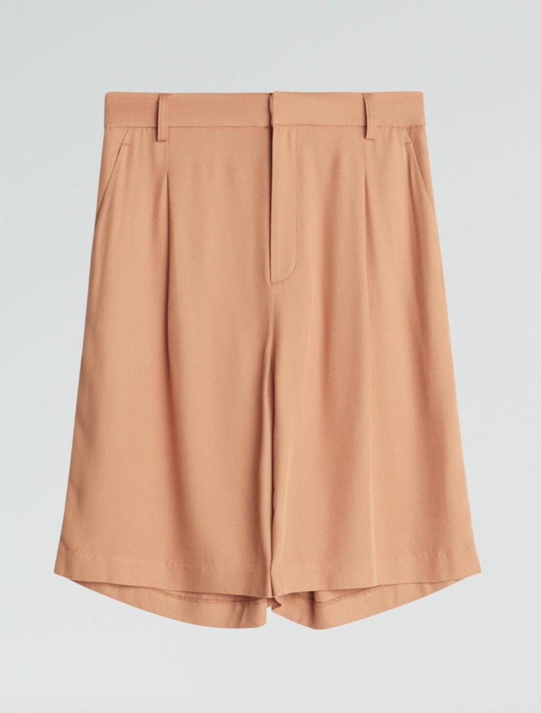 Aprikosfärgade dressade shorts från Gina tricot