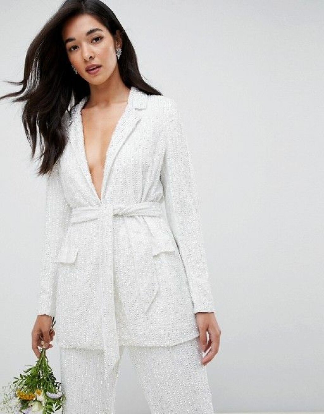 En bild på en paljettprydd kavaj från Asos.