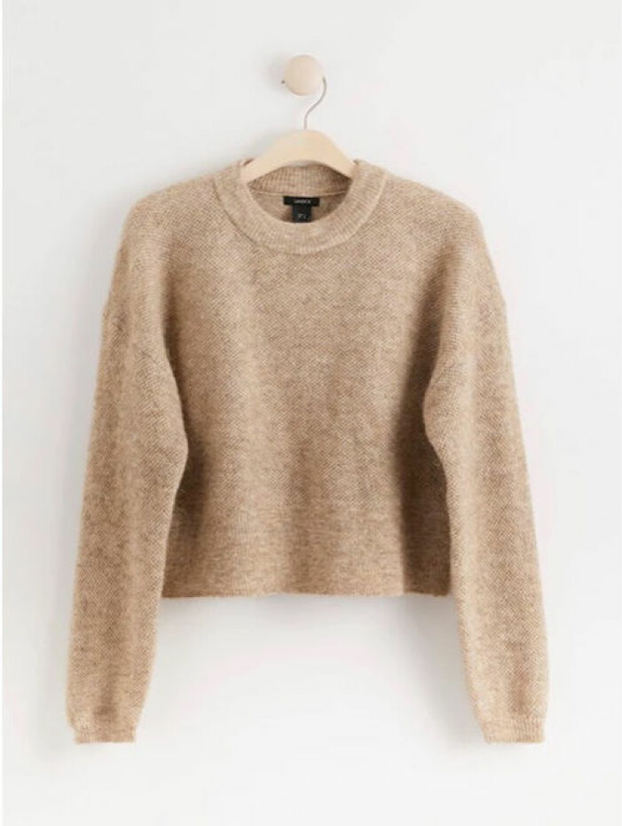 Beige stickad tröja med lång ärm från Lindex