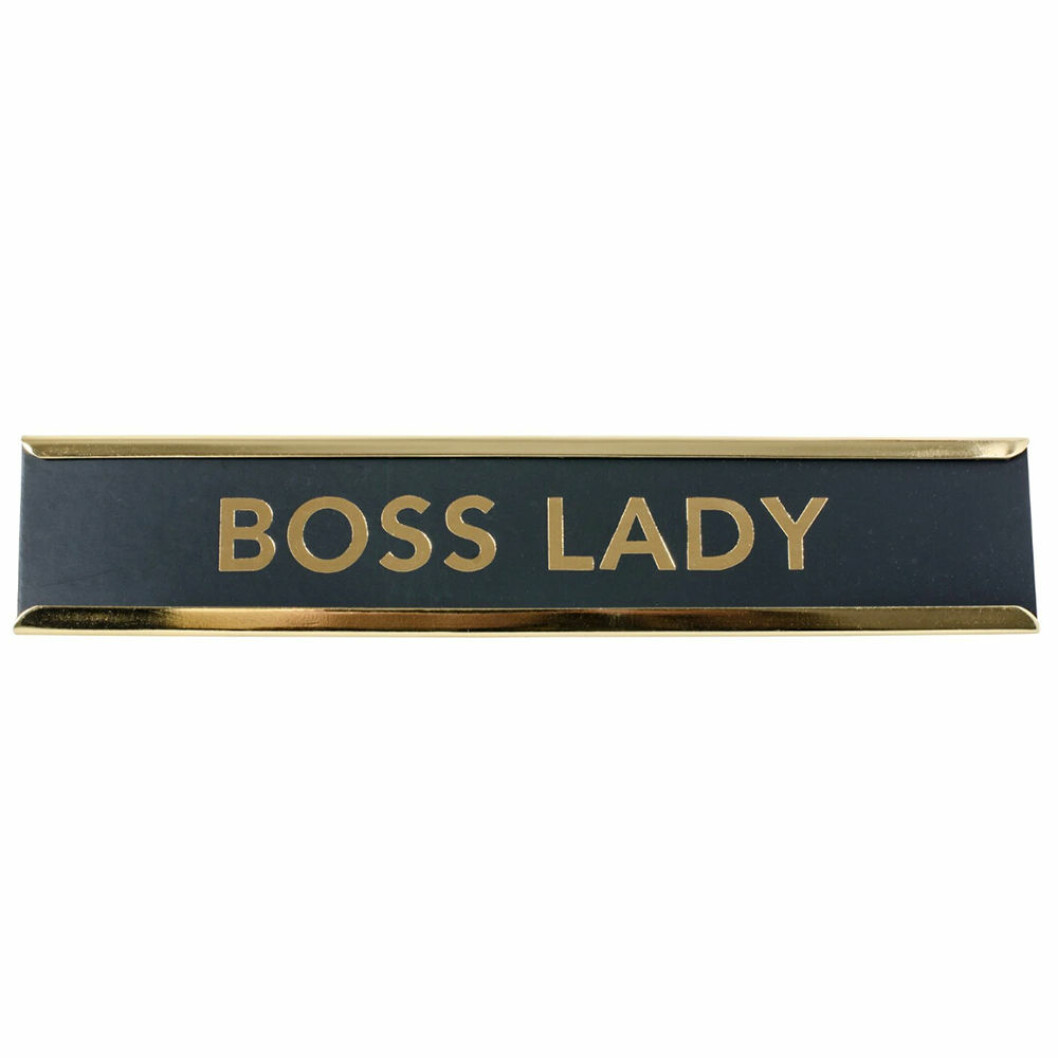 Skylt med Boss Lady på