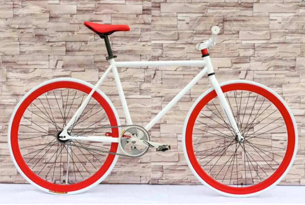 Cykel med röda fälgar