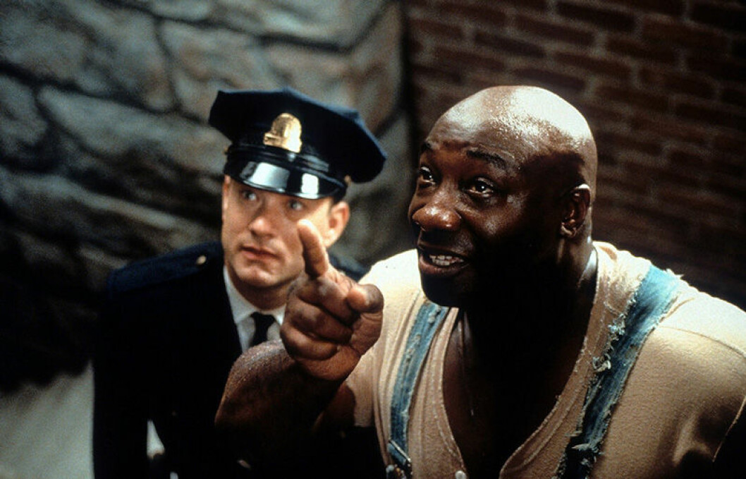 Tom Hanks och Michael Clarke Duncan i Den gröna milen. Foto: Warner Bros. Tom Hanks i Den gröna milen.
