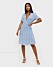 Ljusblå klänning i omlottmodell för dam till 2020