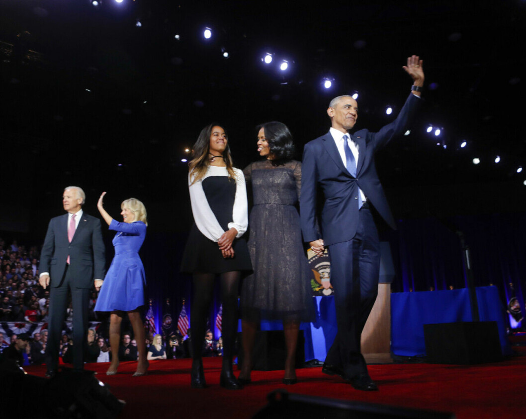 President Barack Obama on stage with first lady Michelle Obama, daughter Malia, Vice President Joe Biden and his wife Jill Biden