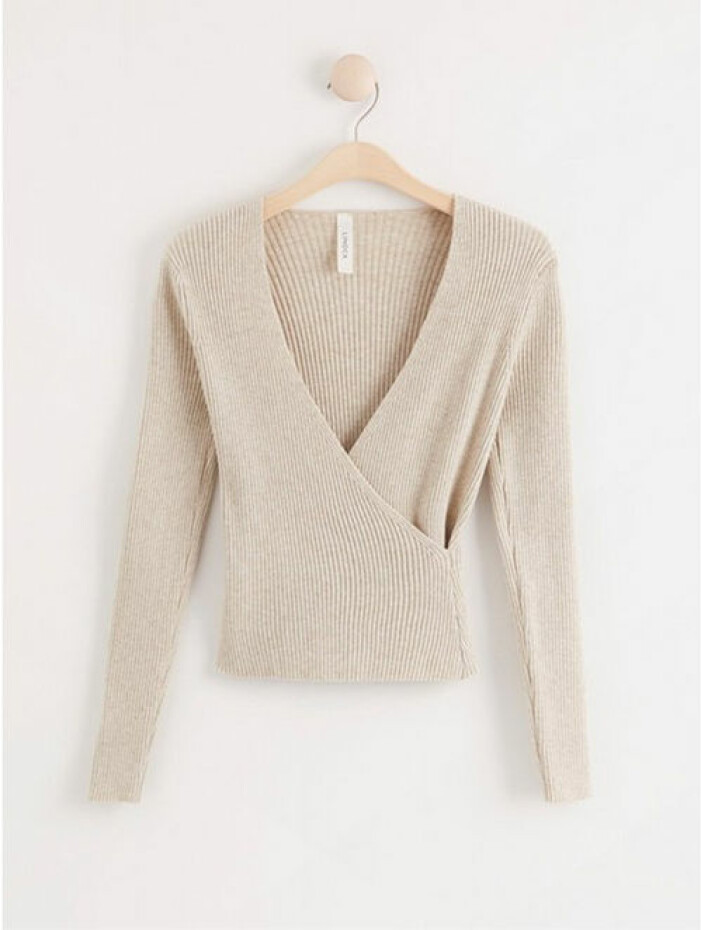 Stickad beige tröja från Lindex
