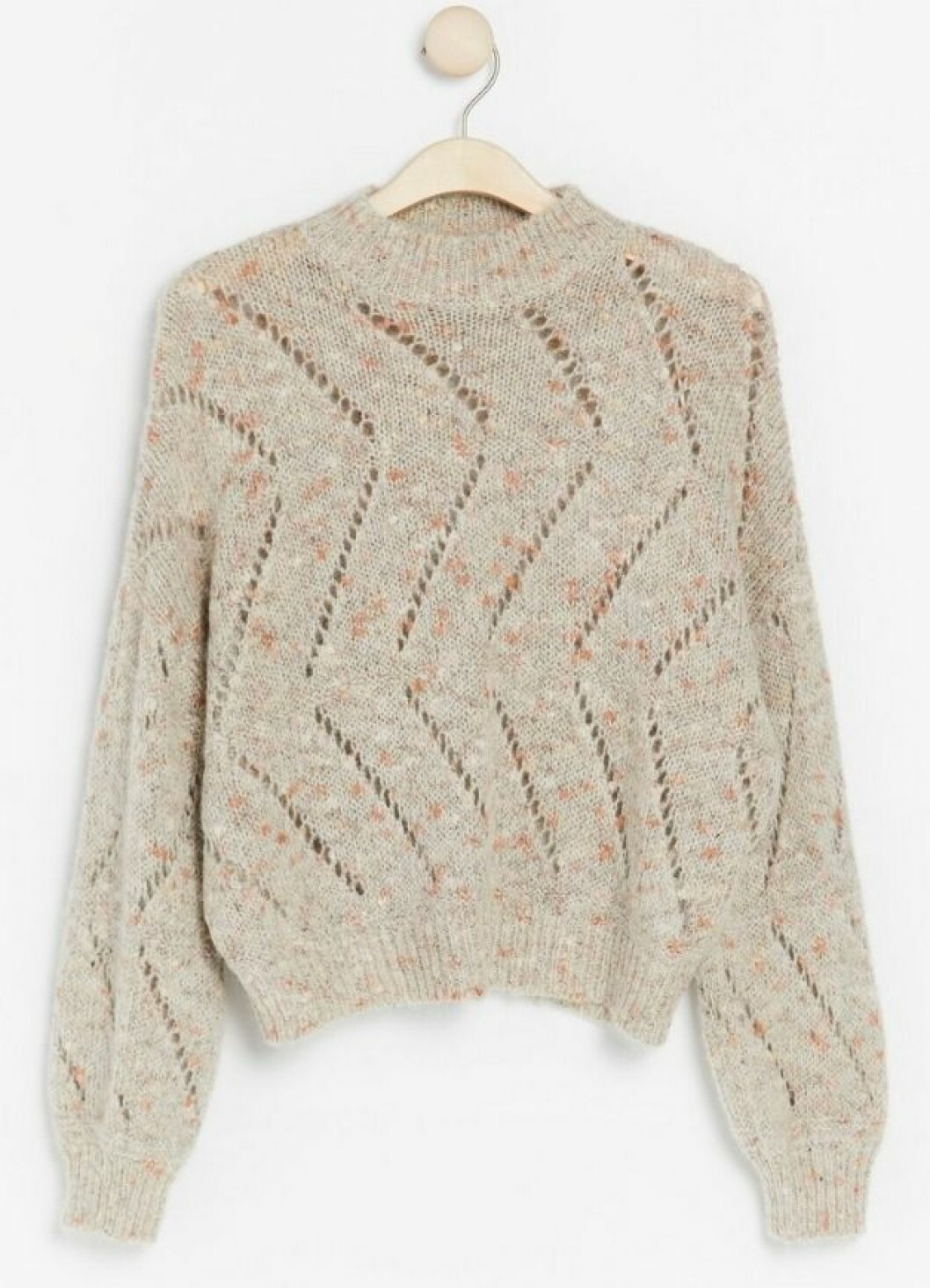 Beige stickad tröja för hösten 2019