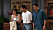 Monica, Ross och Chandler framför postern i Monicas lägenhet