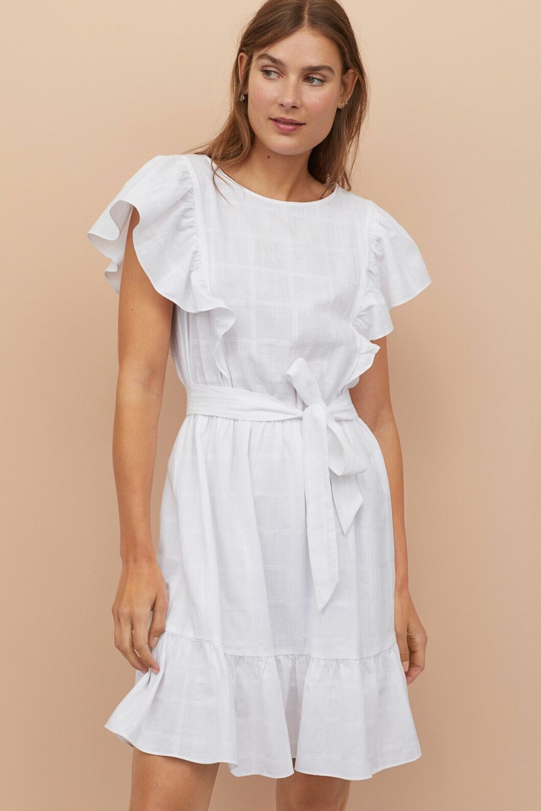 Vit sommarklänning med volanger från H&M